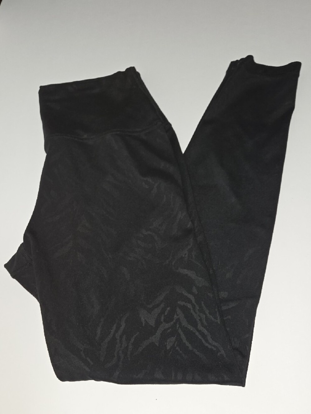 Sweaty Betty Black High-Waist Leggings with Subtle Animal Print